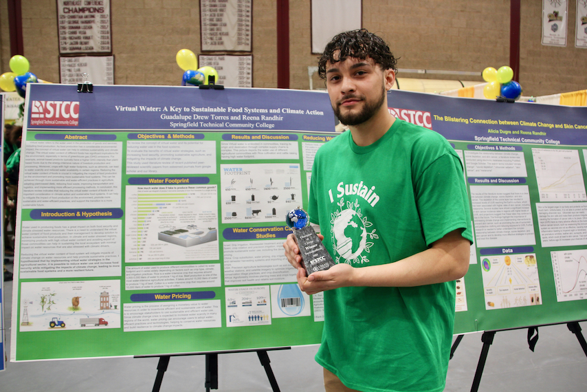 Drew Torres with Research Poster