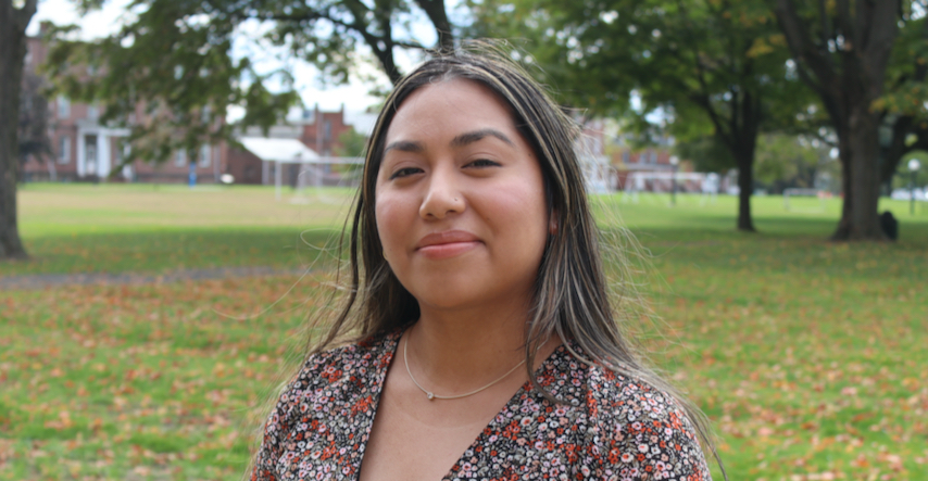 Student Leticia Aguilar-Perez speaks at alumni event at Big E